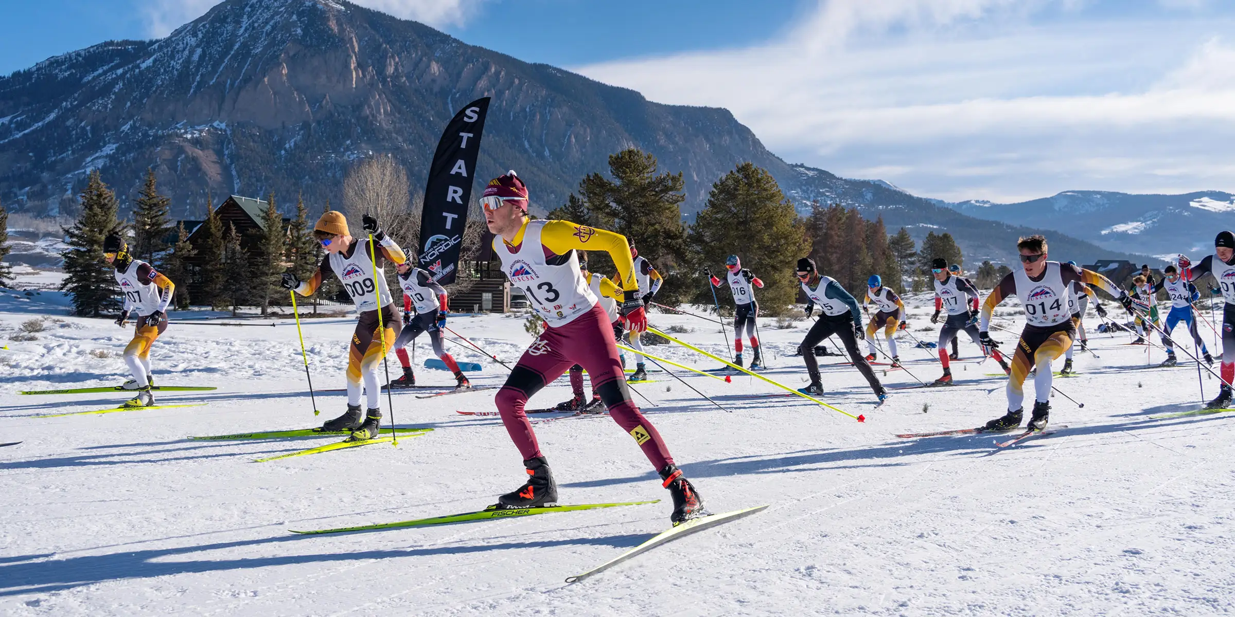 CMU cross country skier competing in a mass start race