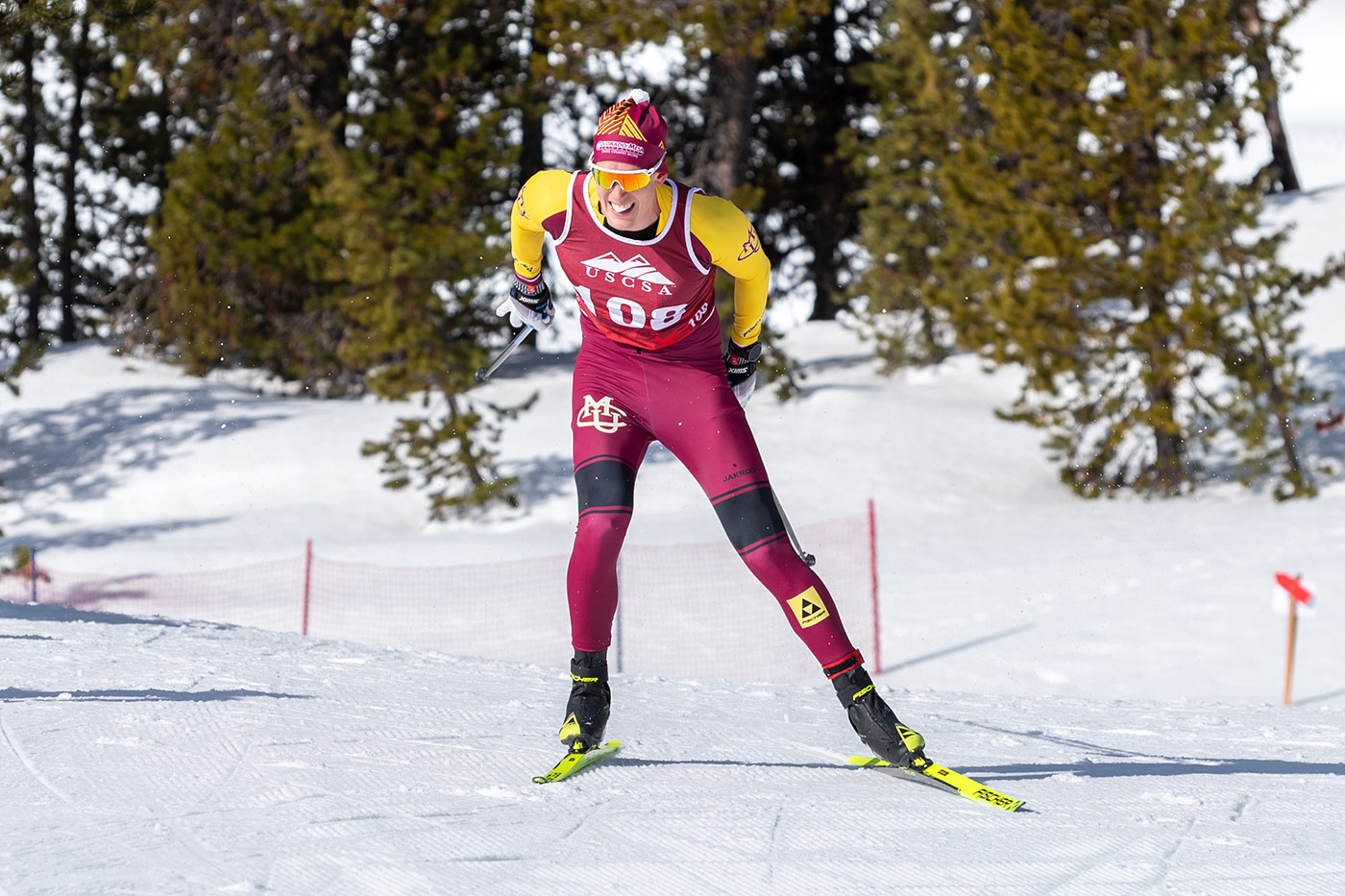 CMU cross country skier skate skiing during a USCSA race, demonstrating pole angle and body position discussed in ski and pole length research.