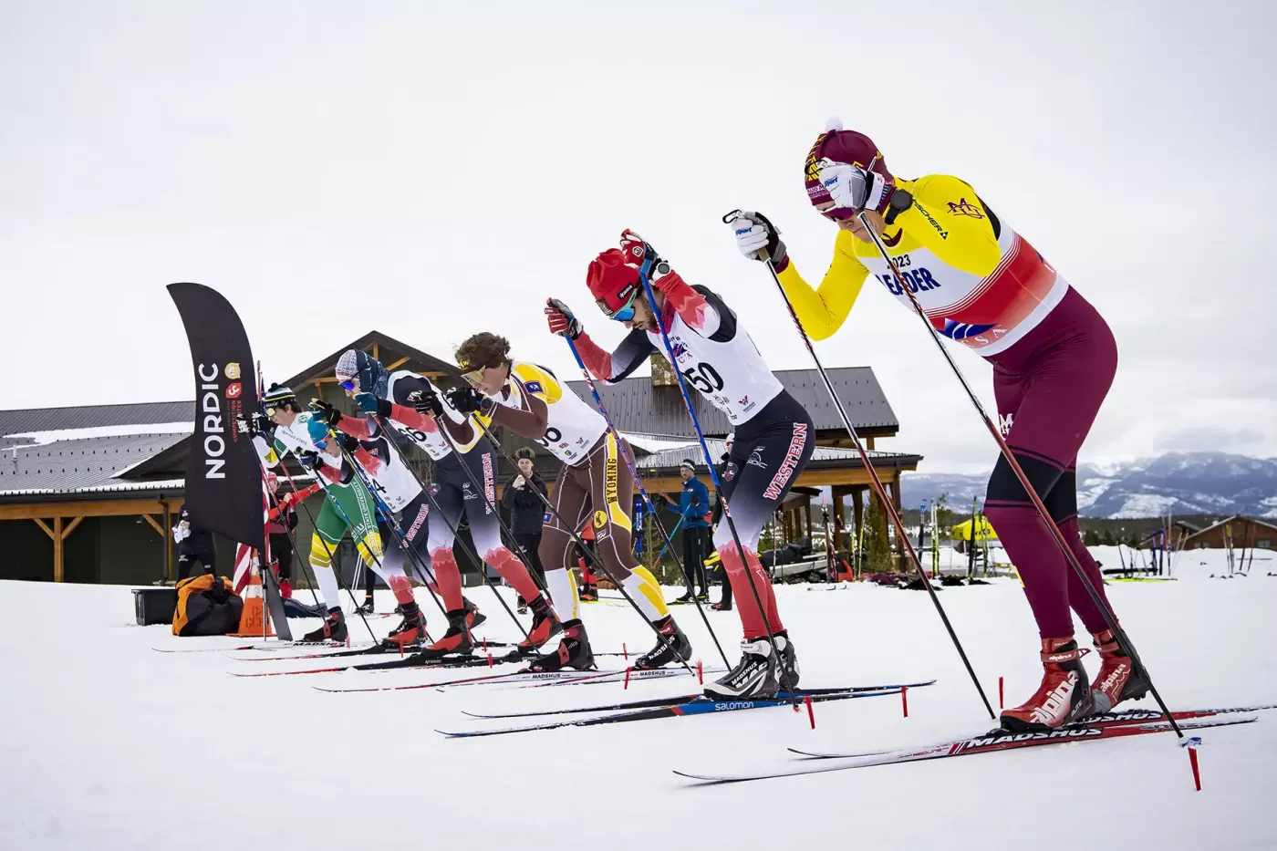 Photo of college ski racers during USCSA race at Snow Mountain Ranch in January 2024.